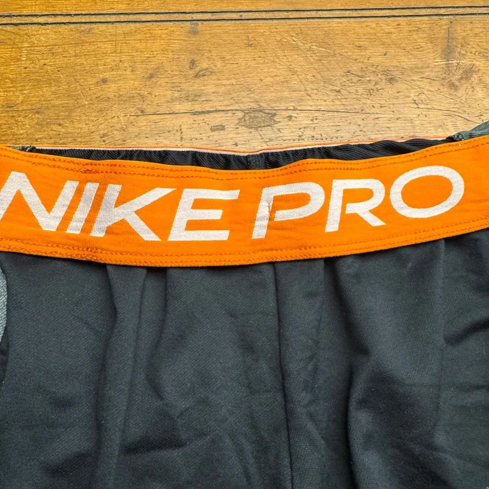 Nike Pro Dri-FIT Womens Small Athletic Shorts Black‎ Grey Orange Waistband